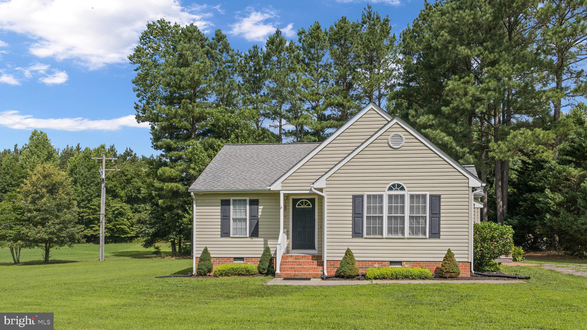 151 Deep Landing Road Tappahannock, VA 22560 - Photo 3 of 31 Simple and well kept landscaping
