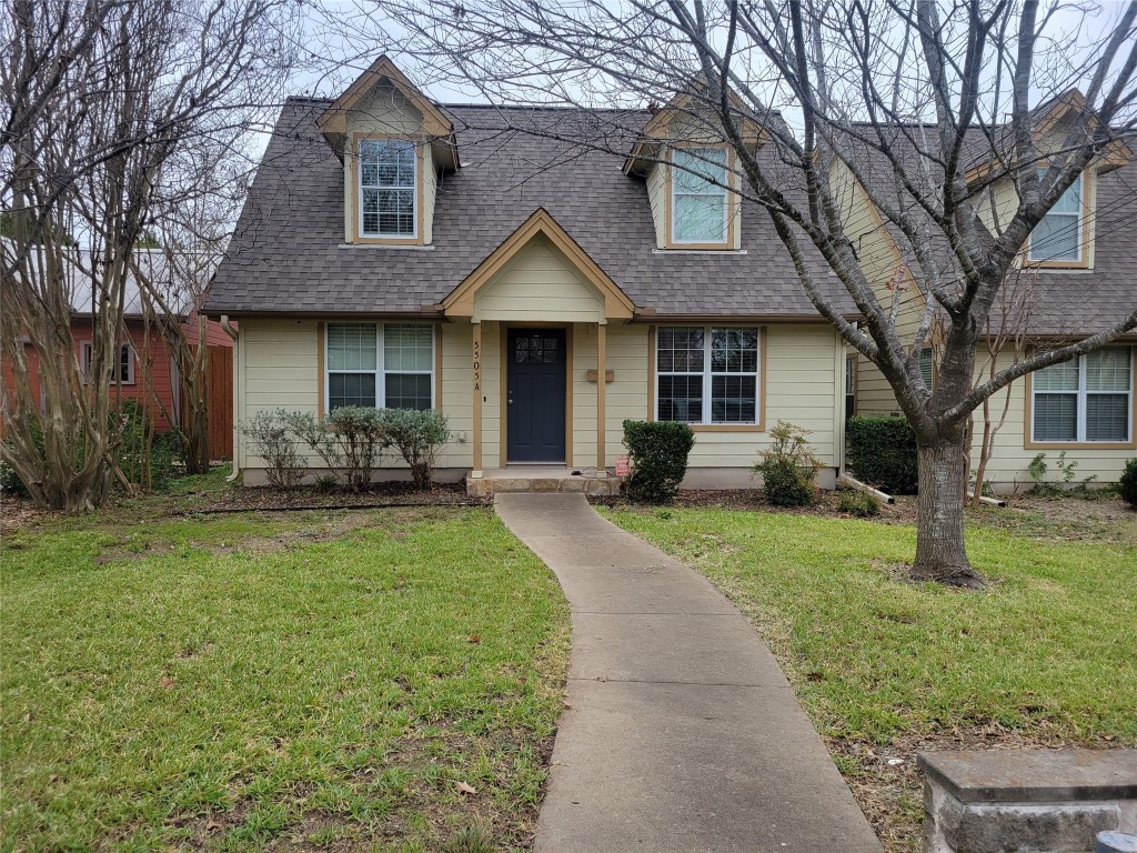 5505 Montview Street, Unit A Austin, TX 78756 - Photo 2 of 37 a front view of a house with a garden and trees