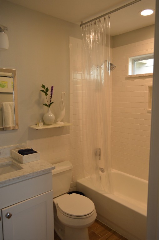 5505 Montview Street, Unit A Austin, TX 78756 - Photo 25 of 37 a bathroom with a shower a toilet and a sink