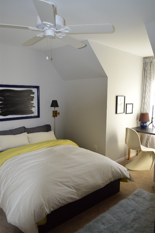 5505 Montview Street, Unit A Austin, TX 78756 - Photo 33 of 37 a bedroom with a bed and a chandelier