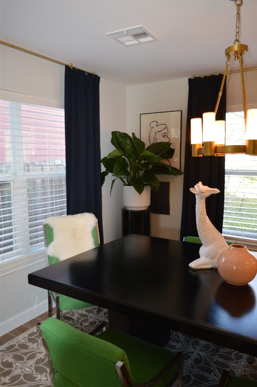 5505 Montview Street, Unit A Austin, TX 78756 - Photo 9 of 37 a view of a dining room with furniture and wooden floor