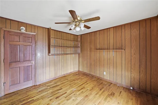 a view of a livingroom with wooden floor