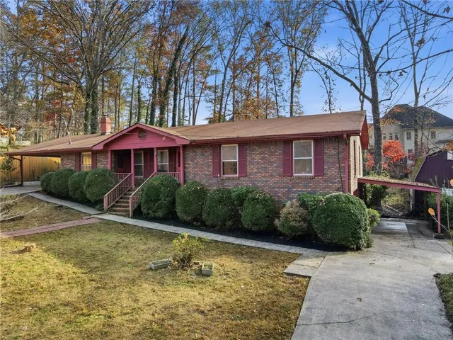 a view of a house with a swimming pool