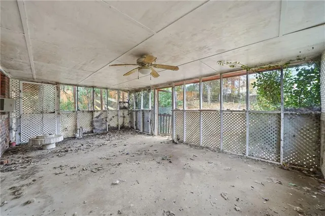 a view of an empty room with a sliding door