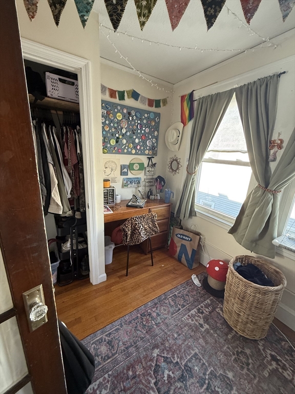 58 Brock Street, Unit 3 Boston, MA 02135 - Photo 14 of 22 a very nice looking bedroom with a large window