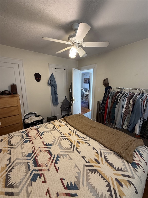 58 Brock Street, Unit 3 Boston, MA 02135 - Photo 20 of 22 a bedroom with a bed and dresser