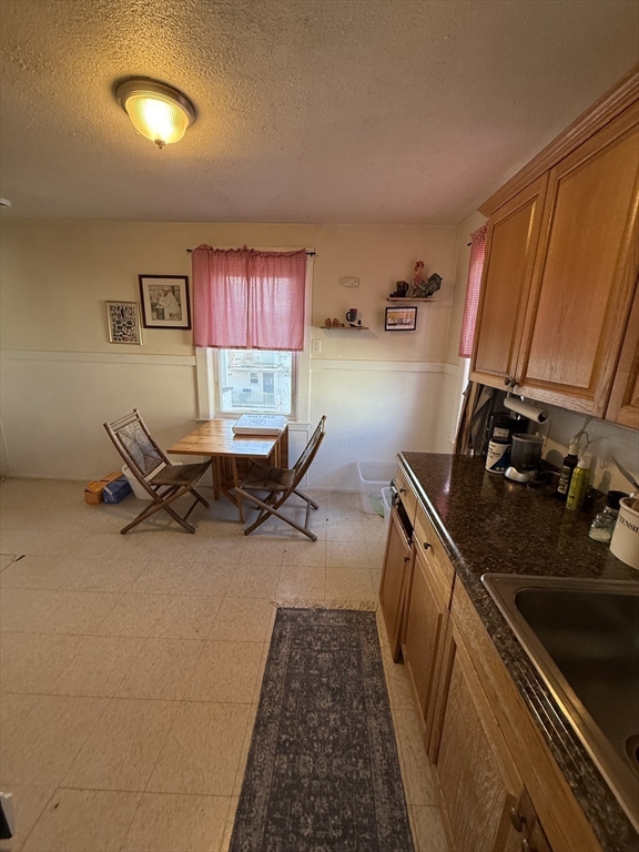58 Brock Street, Unit 3 Boston, MA 02135 - Photo 7 of 22 a living room with furniture