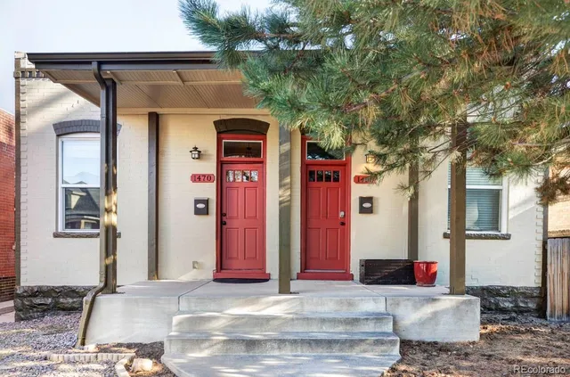 a front view of a house with an outdoor space
