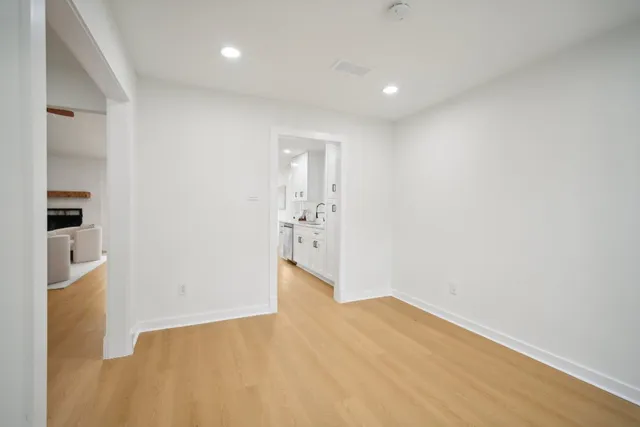 a kitchen with stainless steel appliances a stove a sink dishwasher and a refrigerator