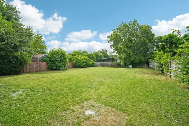 a house with trees in front of it