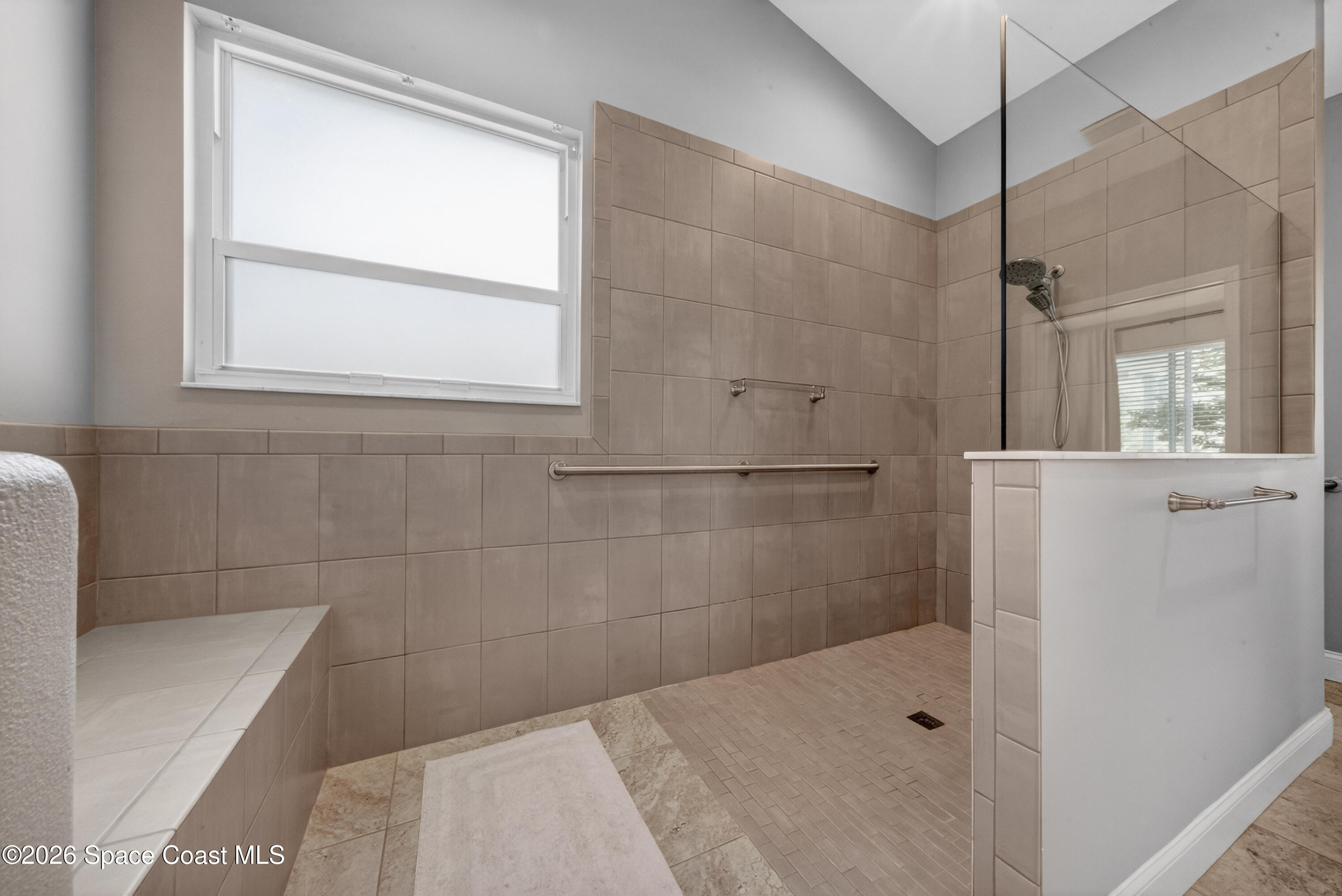 210 Grant Road Merritt Island, FL 32953 - Photo 28 of 64 a bathroom with a shower and a sink