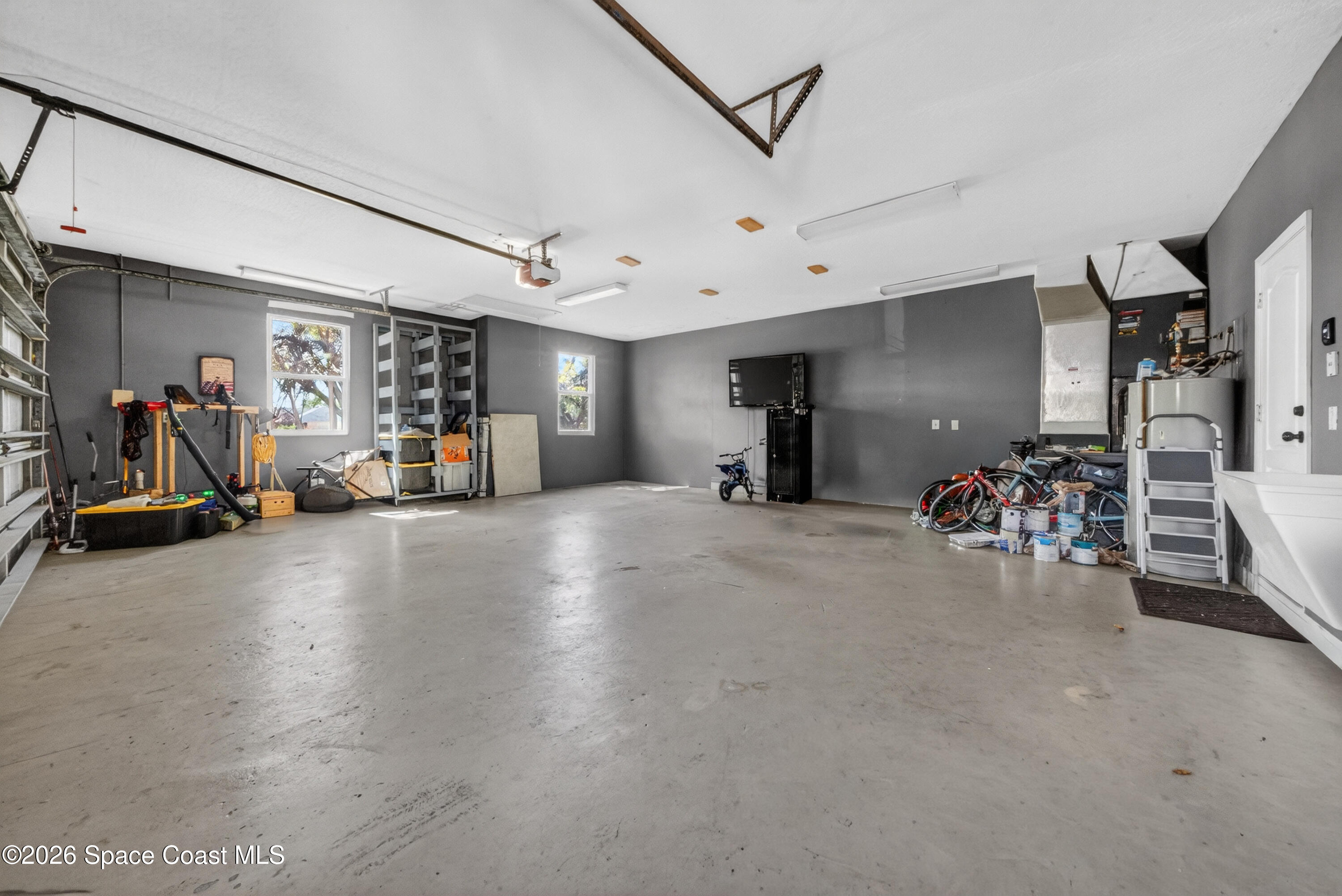 210 Grant Road Merritt Island, FL 32953 - Photo 42 of 64 a view of a room with gym equipment