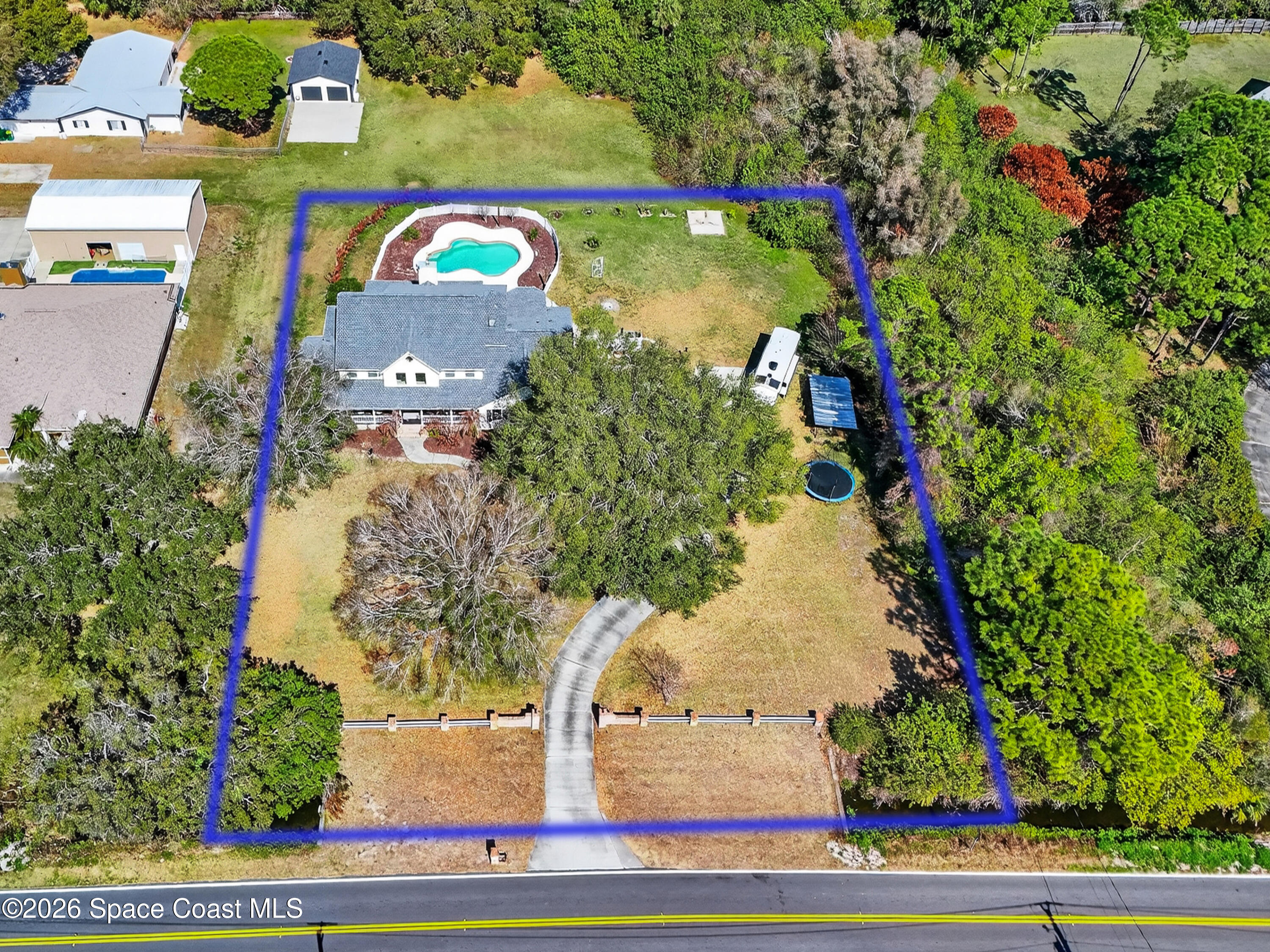 210 Grant Road Merritt Island, FL 32953 - Photo 58 of 64 an aerial view of a house