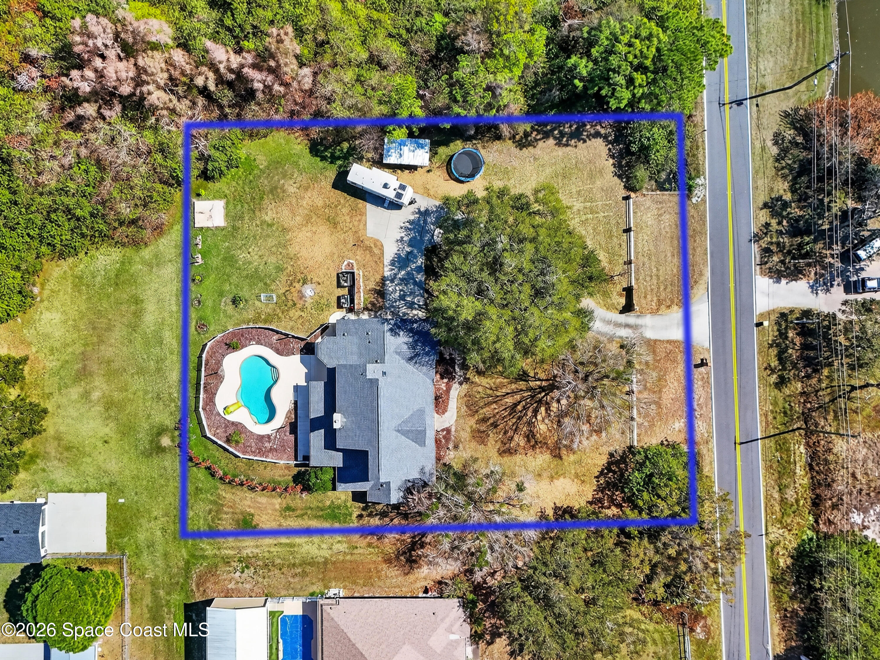 210 Grant Road Merritt Island, FL 32953 - Photo 59 of 64 an aerial view of a houses with yard