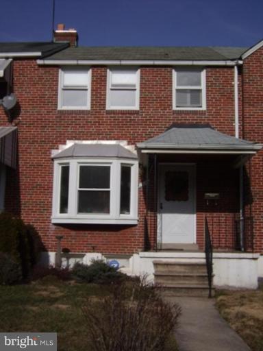 1910 Crestview Road Baltimore, MD 21239 - Photo 1 of 21 a front view of a house with a yard