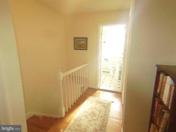 1910 Crestview Road Baltimore, MD 21239 - Photo 11 of 21 a view of a hallway with a window