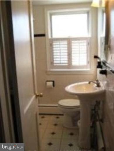 1910 Crestview Road Baltimore, MD 21239 - Photo 13 of 21 a bathroom with a sink toilet and tub