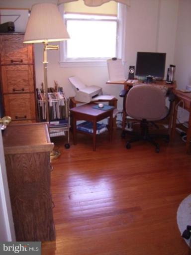 1910 Crestview Road Baltimore, MD 21239 - Photo 16 of 21 a bedroom with furniture and a window