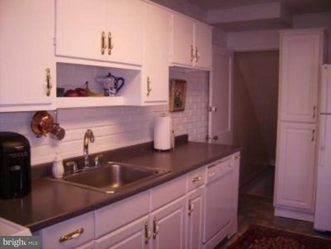 1910 Crestview Road Baltimore, MD 21239 - Photo 10 of 21 a kitchen with a sink and cabinets