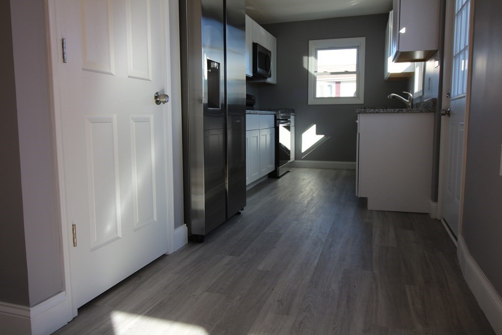 6 Aberdeen Street Fall River, MA 02721 - Photo 3 of 30 a view of hallway with wooden floor