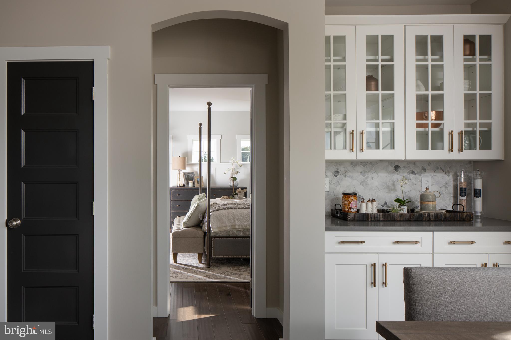 202 Angelica Way New Freedom, PA 17349 - Photo 26 of 48 a kitchen with a refrigerator and cabinets