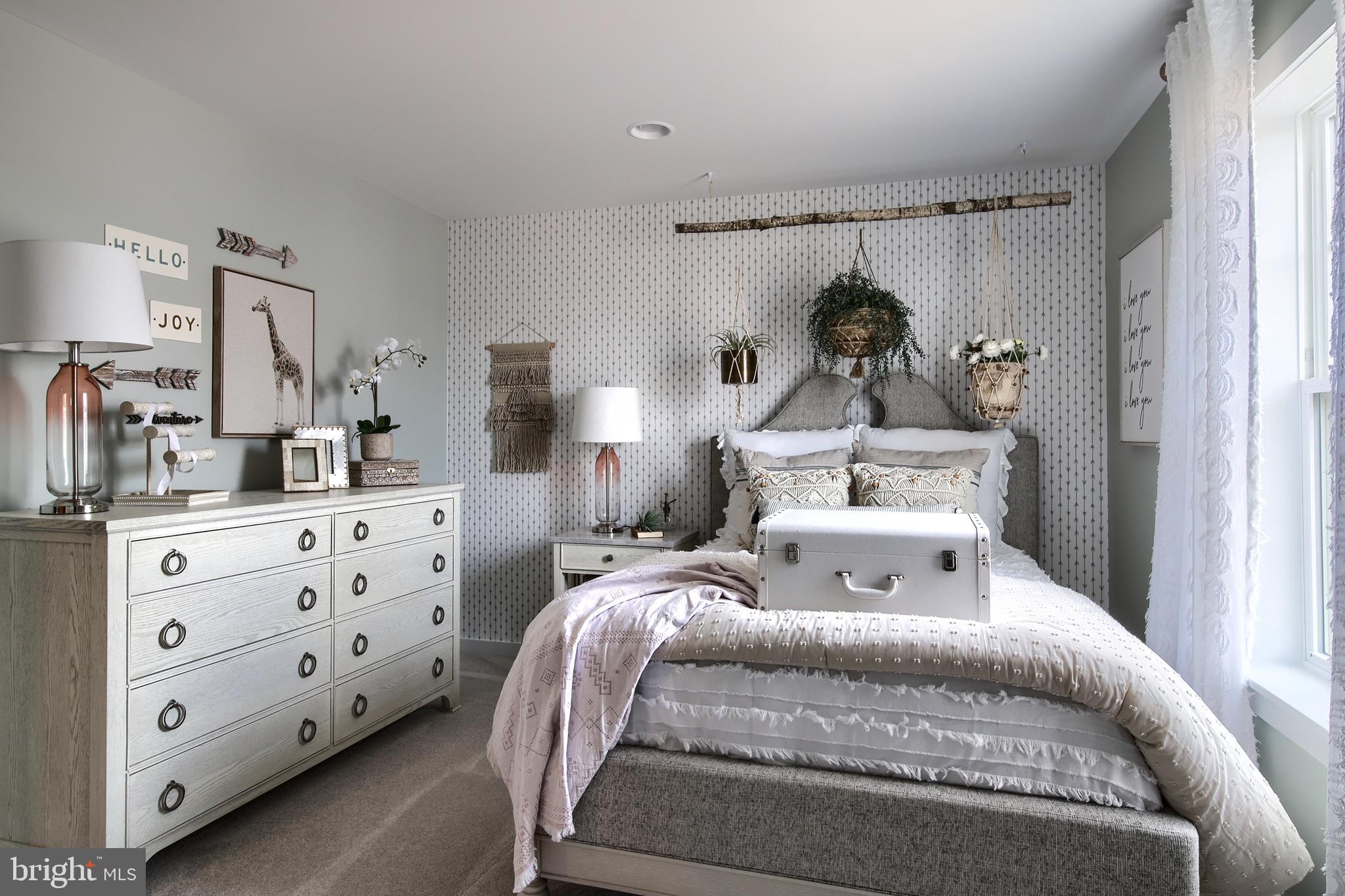 202 Angelica Way New Freedom, PA 17349 - Photo 34 of 48 a bed room with a bed and a night stand