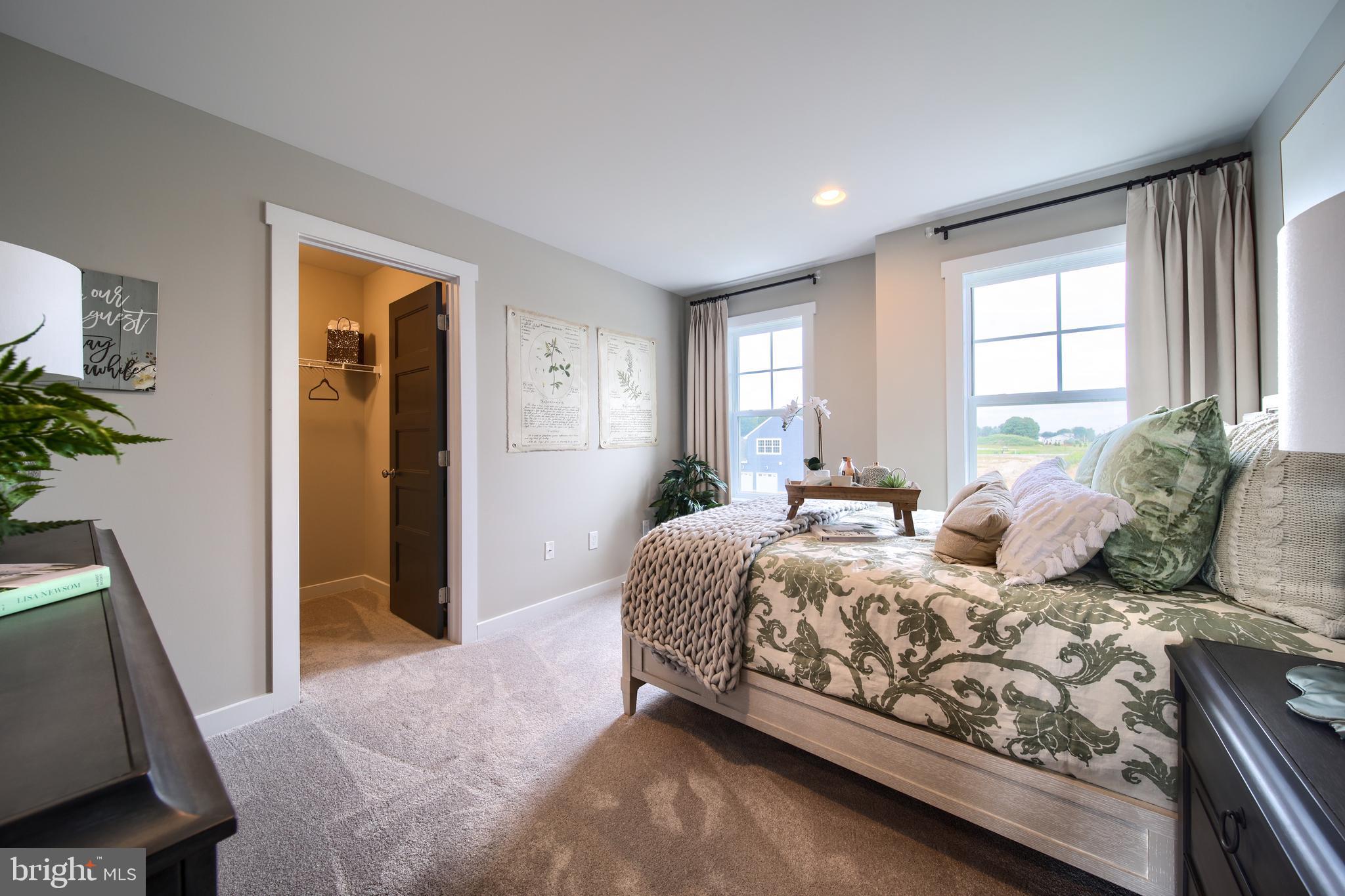 202 Angelica Way New Freedom, PA 17349 - Photo 36 of 48 a bedroom with a large bed and a window