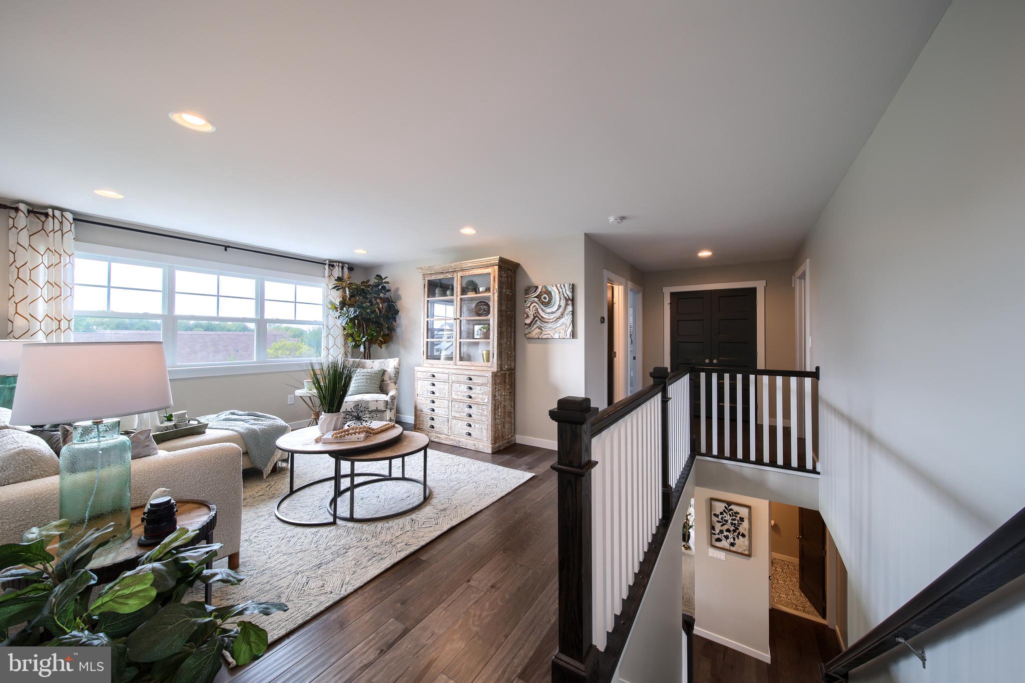 202 Angelica Way New Freedom, PA 17349 - Photo 40 of 48 a living room with furniture and a wooden floor