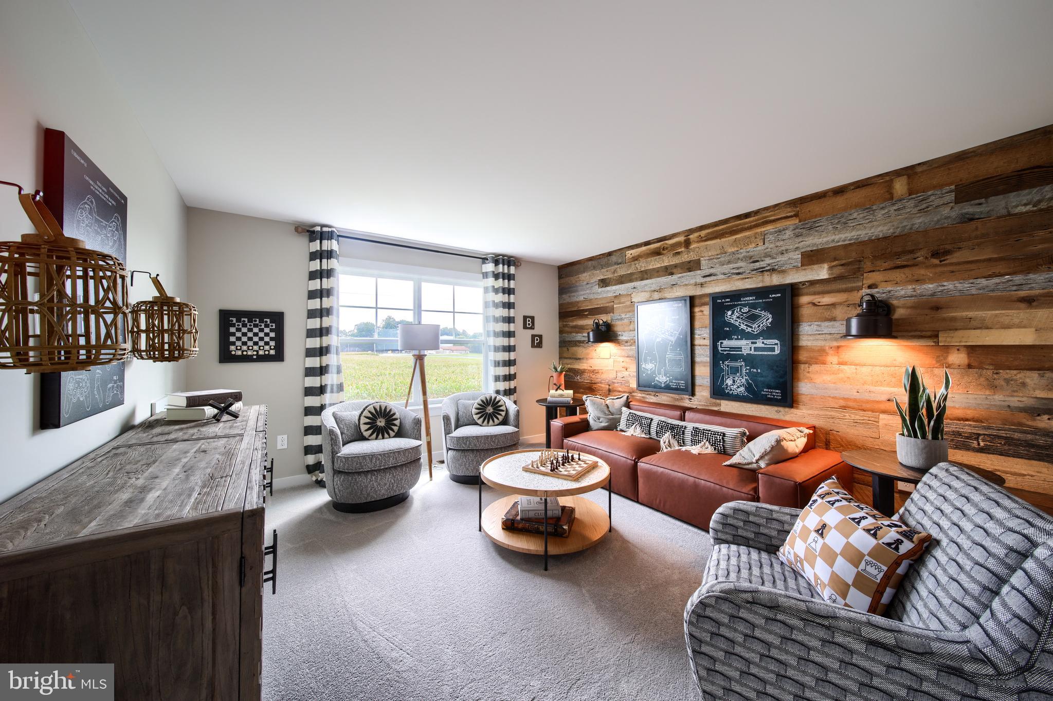 202 Angelica Way New Freedom, PA 17349 - Photo 7 of 48 a living room with furniture and a large window