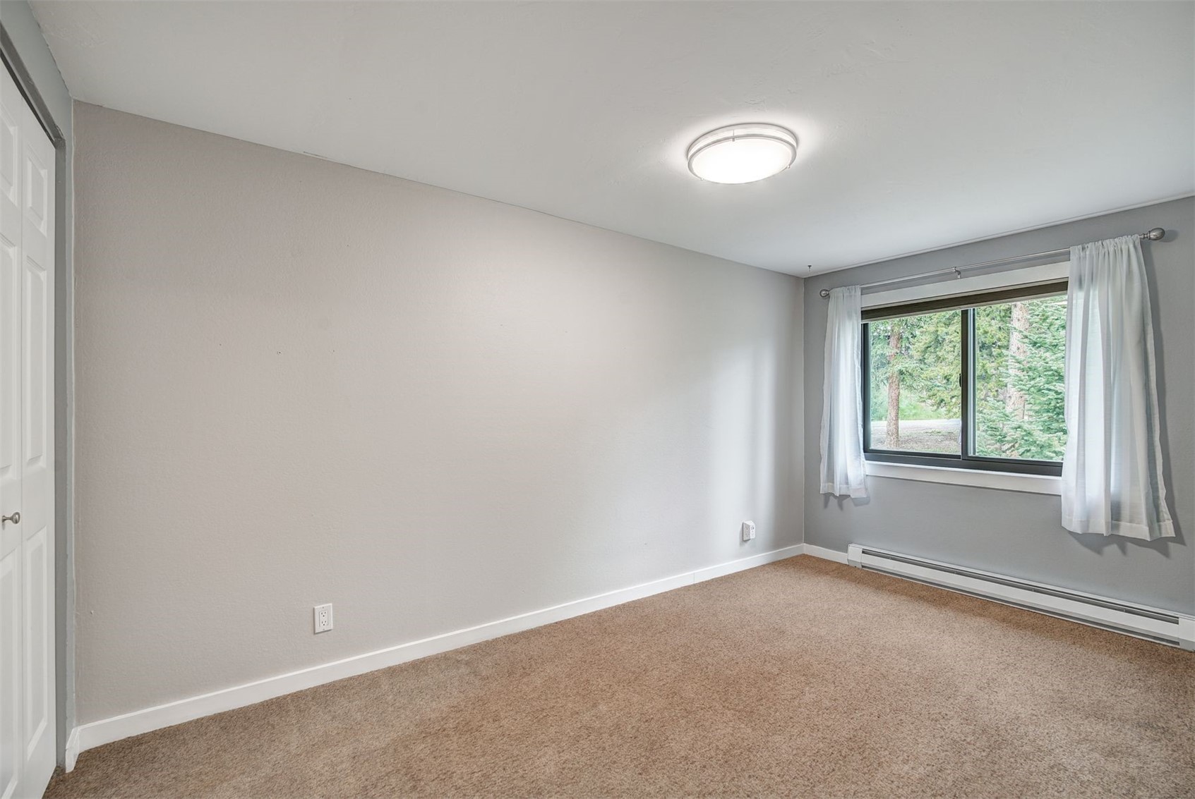 52 Club House Road, Unit 44 Breckenridge, CO 80424 - Photo 16 of 28 an empty room with a window