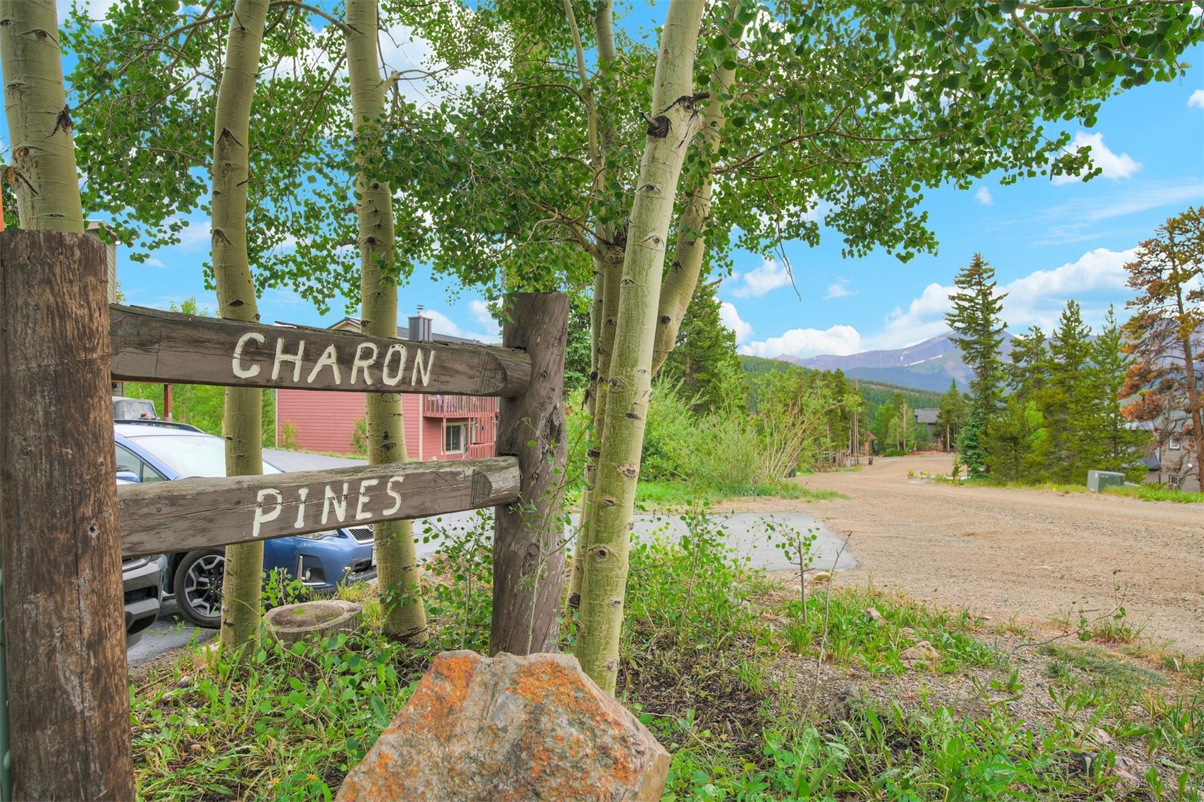 52 Club House Road, Unit 44 Breckenridge, CO 80424 - Photo 28 of 28 a sign board with tree in the background