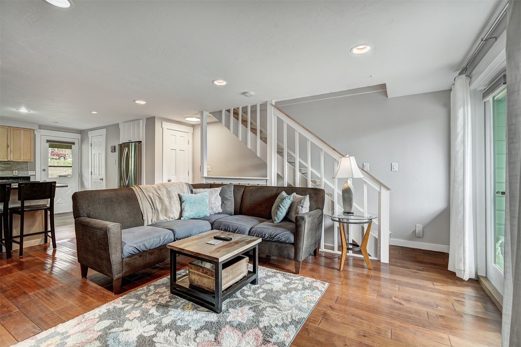52 Club House Road, Unit 44 Breckenridge, CO 80424 - Photo 9 of 28 a living room with furniture and a wooden floor