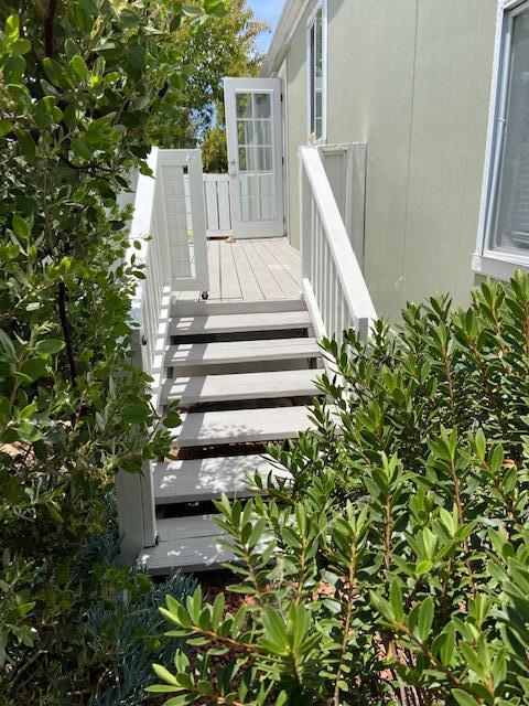 80 Zaca Street, Unit SPC 15 Buellton, CA 93427 - Photo 11 of 17 a view of a house with a yard and large trees