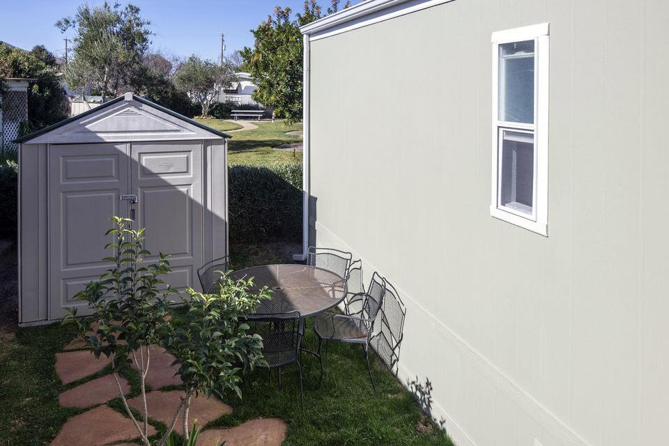 80 Zaca Street, Unit SPC 15 Buellton, CA 93427 - Photo 13 of 17 a front view of a house with garden