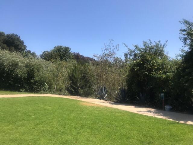 80 Zaca Street, Unit SPC 15 Buellton, CA 93427 - Photo 15 of 17 a backyard of a house with lots of green space