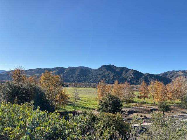 80 Zaca Street, Unit SPC 15 Buellton, CA 93427 - Photo 16 of 17 a view of a lush green hillside and houses