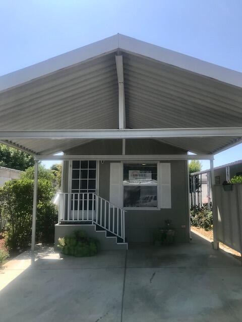 80 Zaca Street, Unit SPC 15 Buellton, CA 93427 - Photo 2 of 17 a view of a house with a balcony