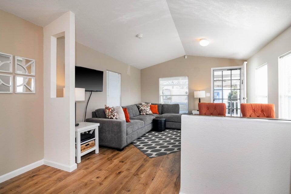 80 Zaca Street, Unit SPC 15 Buellton, CA 93427 - Photo 3 of 17 a living room with furniture and a flat screen tv