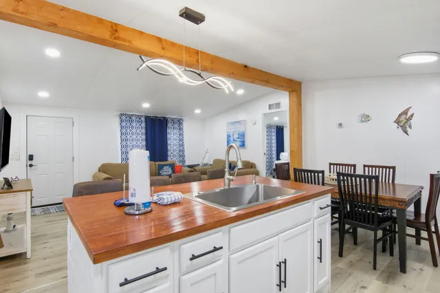 a kitchen with a table and chairs