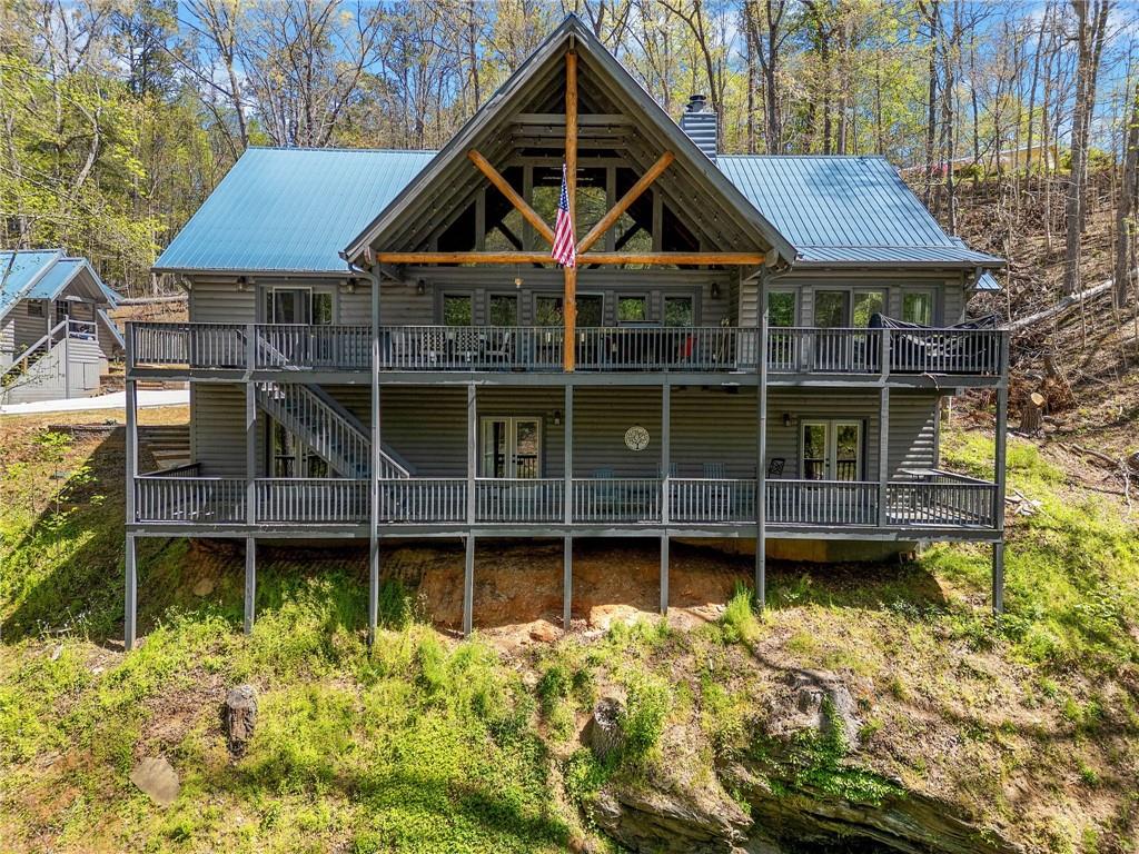 665 Little Refuge Road Waleska, GA 30183 - Photo 3 of 73 a front view of a house with a yard