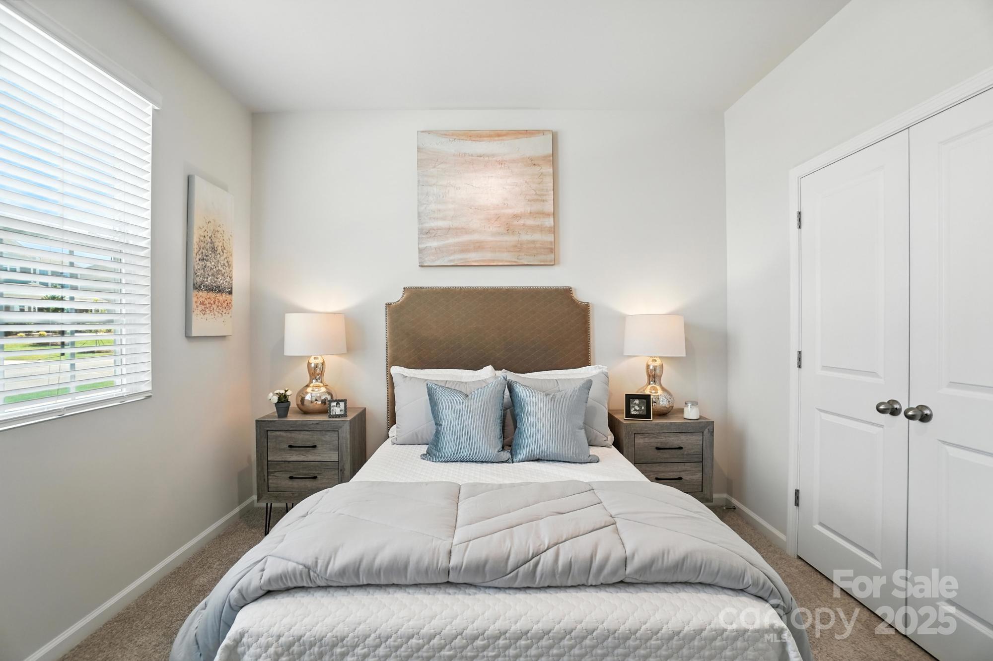 1217 Roscoe Court Monroe, NC 28112 - Photo 20 of 46 a bedroom with a bed and window