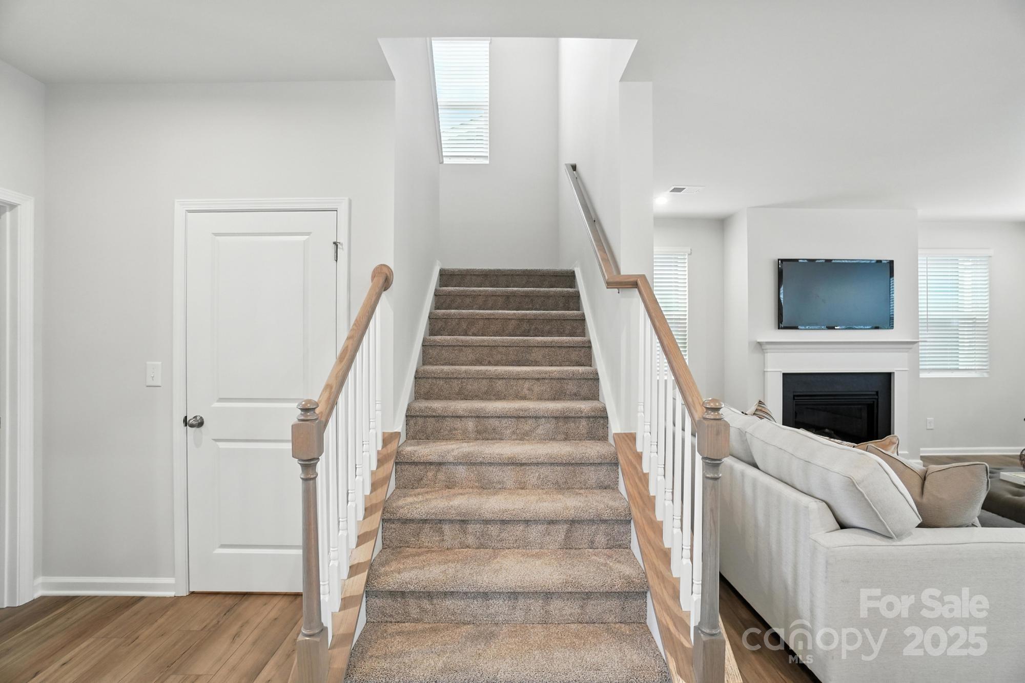 1217 Roscoe Court Monroe, NC 28112 - Photo 23 of 46 a view of entryway and hall with wooden floor