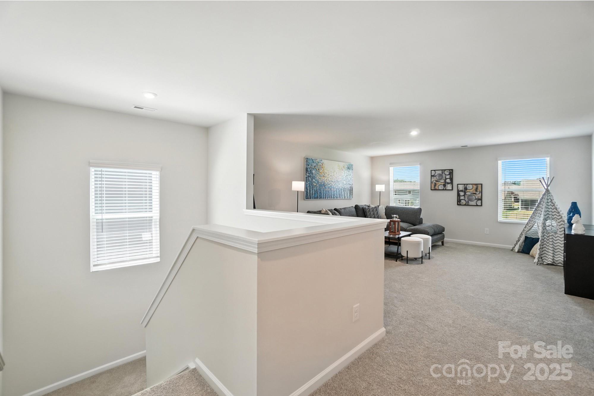 1217 Roscoe Court Monroe, NC 28112 - Photo 24 of 46 a view of living room with furniture and a window