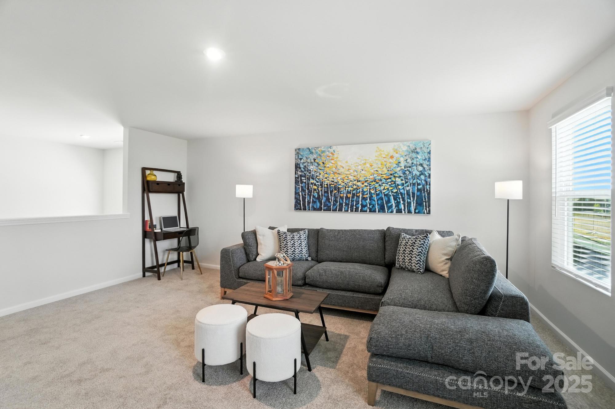 1217 Roscoe Court Monroe, NC 28112 - Photo 27 of 46 a living room with furniture and a window