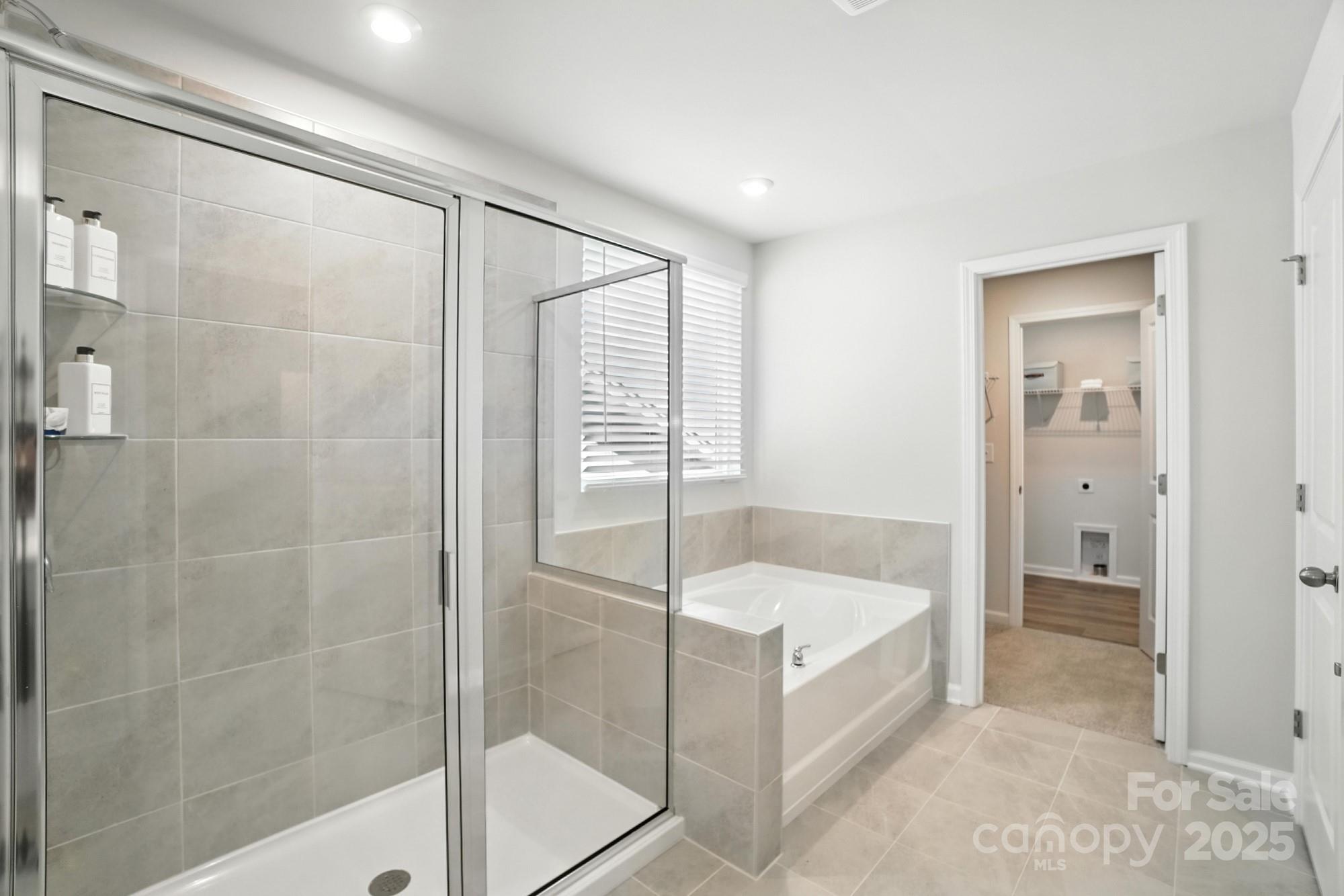 1217 Roscoe Court Monroe, NC 28112 - Photo 34 of 46 a bathroom with a tub and shower
