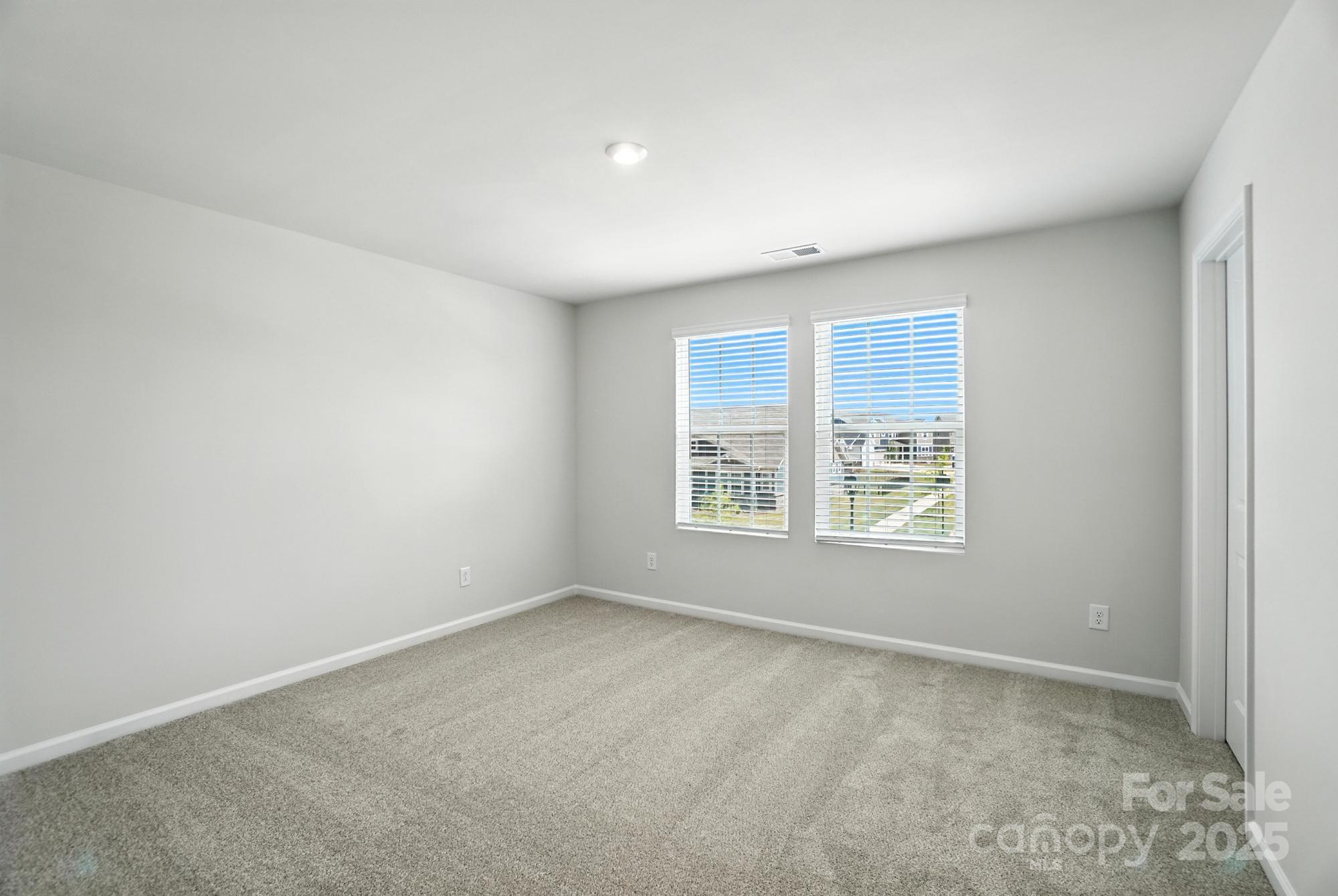 1217 Roscoe Court Monroe, NC 28112 - Photo 38 of 46 an empty room with a window