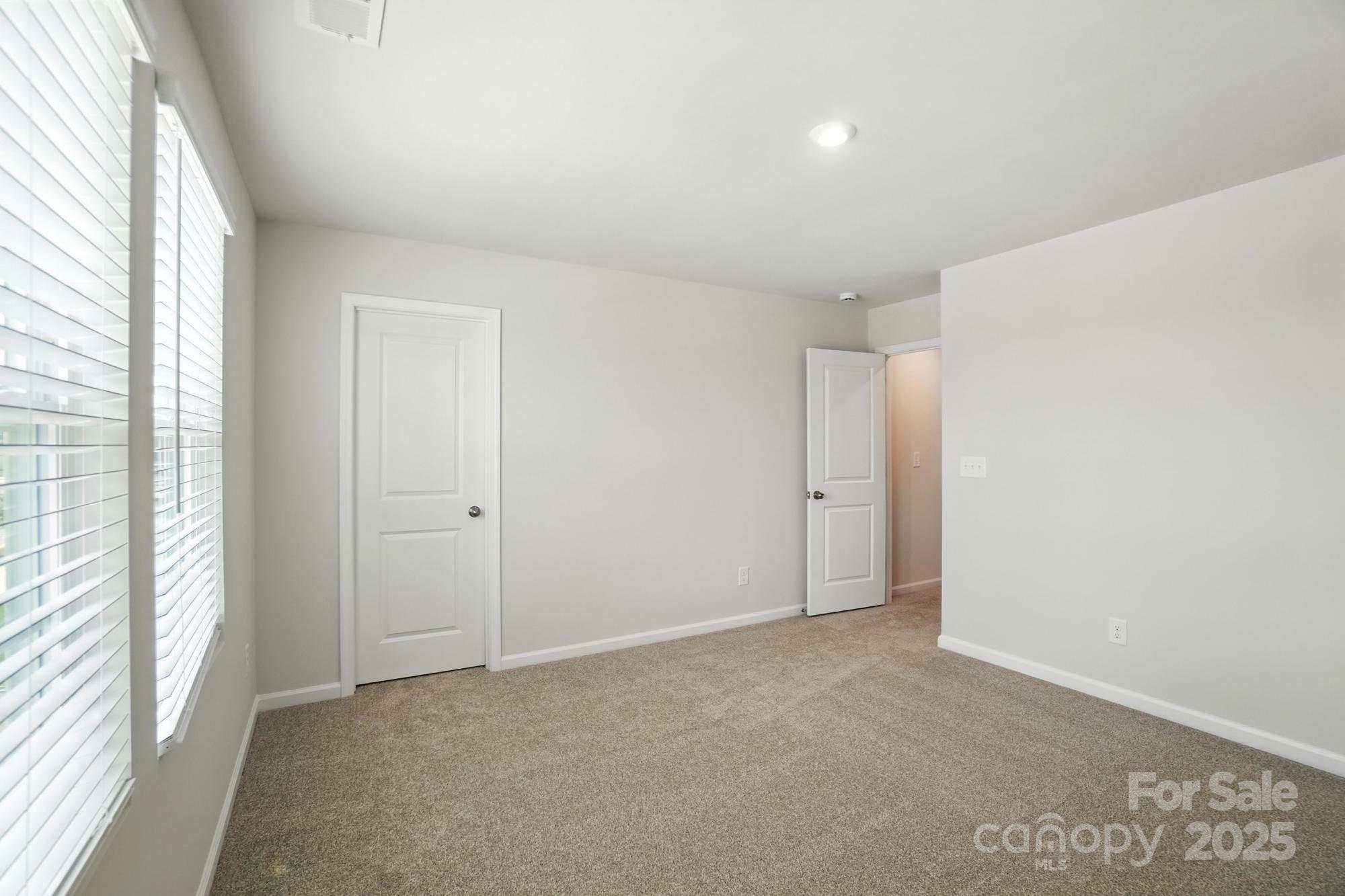 1217 Roscoe Court Monroe, NC 28112 - Photo 39 of 46 a view of an empty room and a window