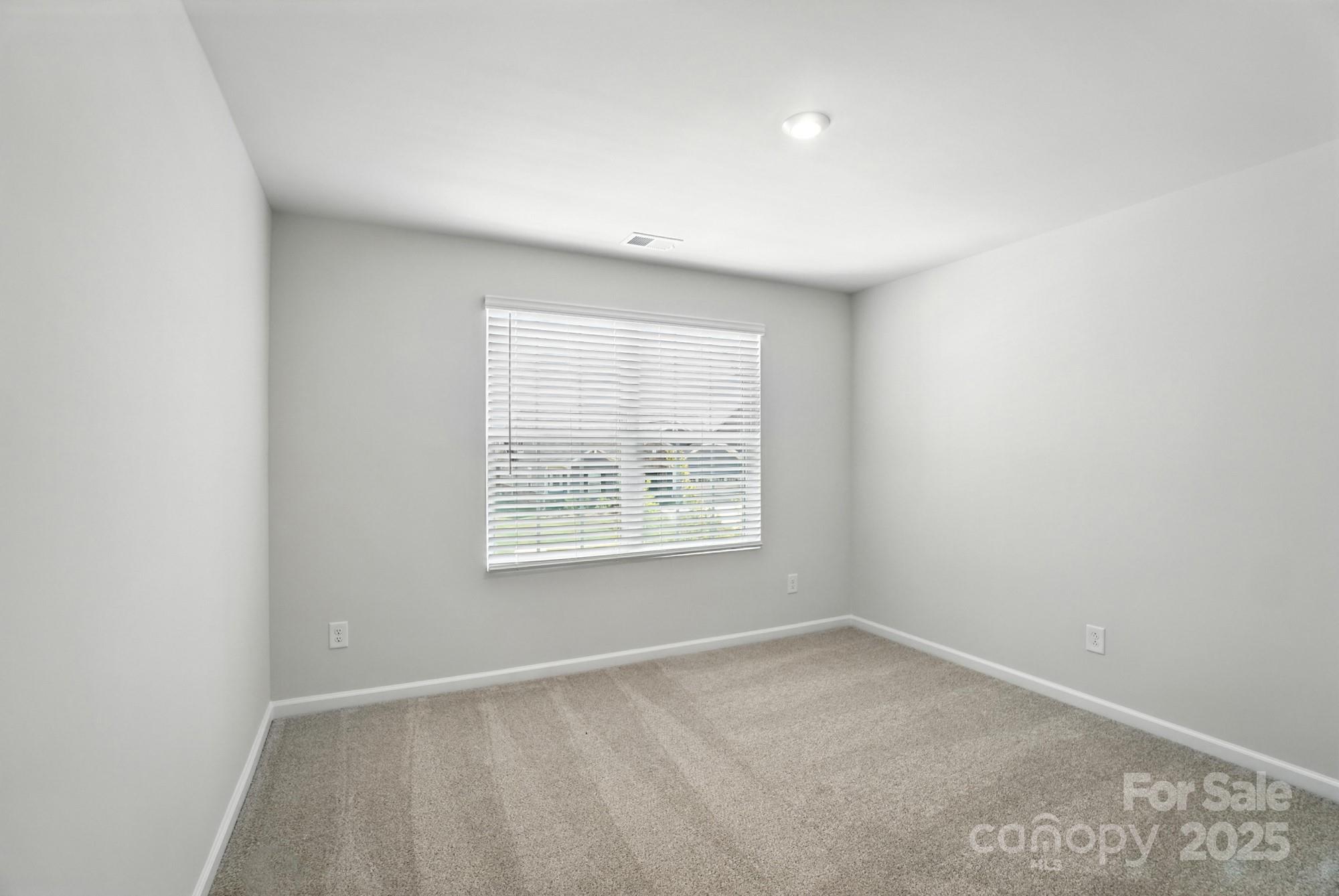 1217 Roscoe Court Monroe, NC 28112 - Photo 41 of 46 an empty room with a window