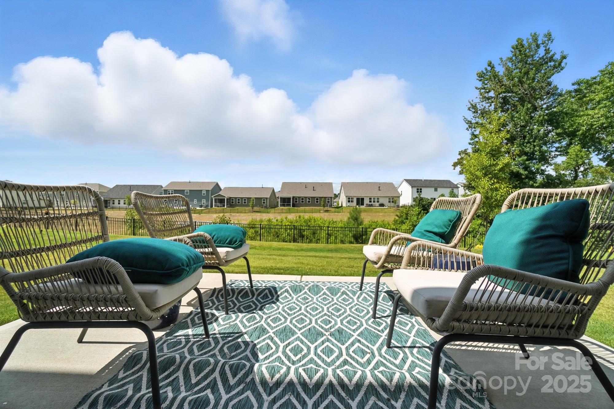 1217 Roscoe Court Monroe, NC 28112 - Photo 46 of 46 an outdoor sitting area with furniture and city view
