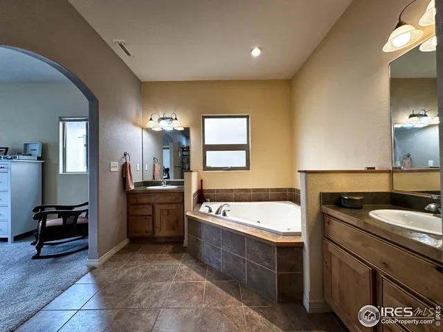 a kitchen with a sink a counter top space and appliances